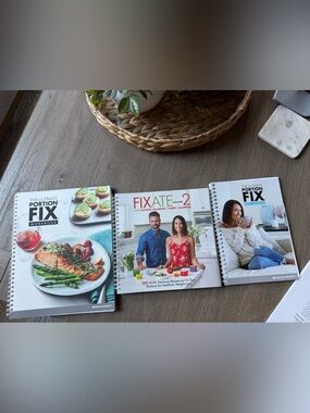 Beachbody Ultimate Portion Fix workbook, fixate 2 cookbook, and logbook set